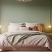 sage green and pink bedroom